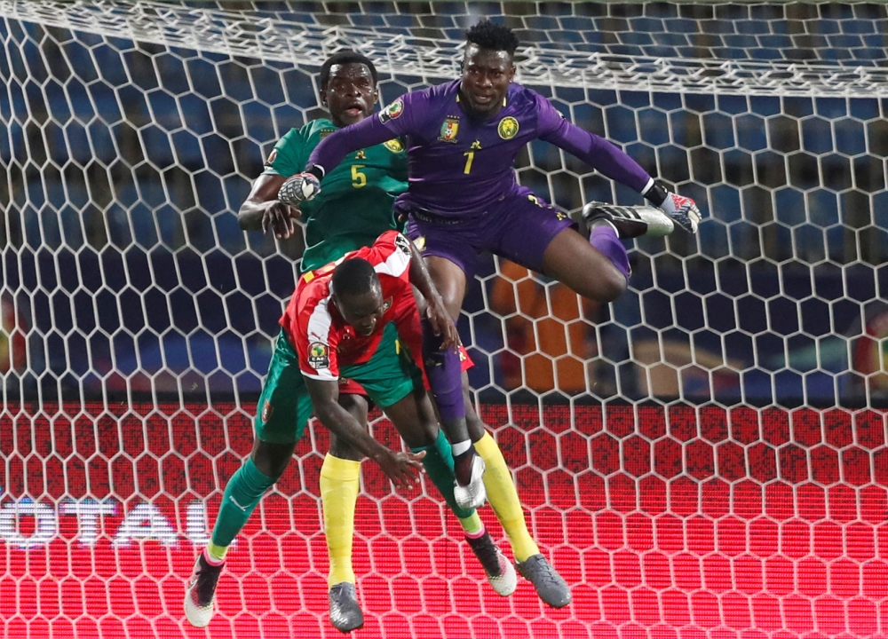 Guinea-Bissau's Jonas Mendes reacts after conceding a goal during the 2019 Africa Cup of Nations (CAN) football match against Caneroon at the Ismailia Stadium on Tuesday. — Reuters