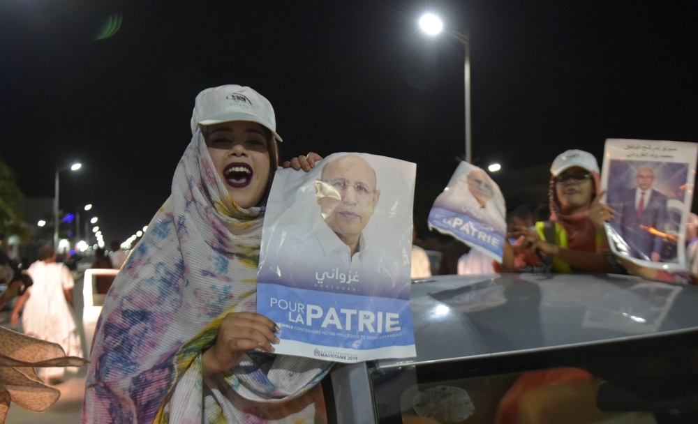 People celebrate the presidential election victory by Mauritania's ruling party candidate Mohamed Ould Ghazouani in Nouakchoot on June 23. -AFP
 