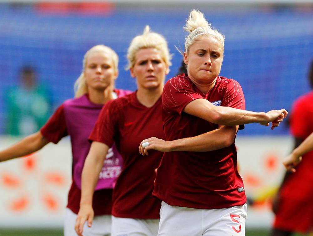 England's Steph Houghton and Millie Bright during the warm up before the Women's World Cup round of 16 match against Cameroon at Stade du Hainaut, Valenciennes, France on Sunday. — Reuters 