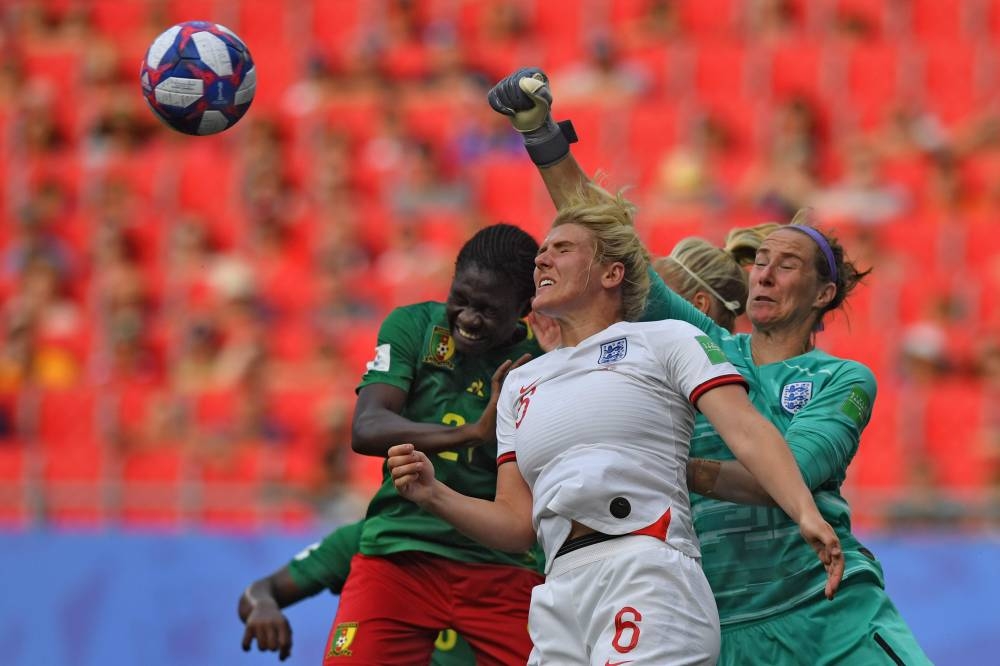 England's Steph Houghton and Millie Bright during the warm up before the Women's World Cup round of 16 match against Cameroon at Stade du Hainaut, Valenciennes, France on Sunday. — Reuters 
