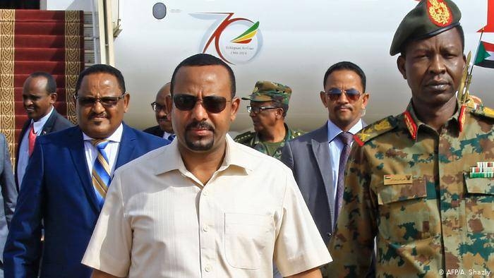 Prime Minister Abiy Ahmed, center, has led Ethiopia since April 2018