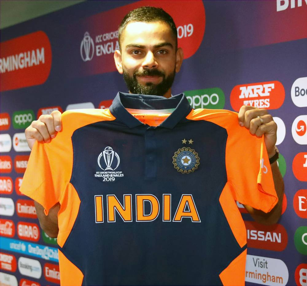 India's Virat Kohli poses with his shirt during a ICC Cricket World Cup press conference at Edgbaston, Birmingham, Britain on Saturday. — Reuters