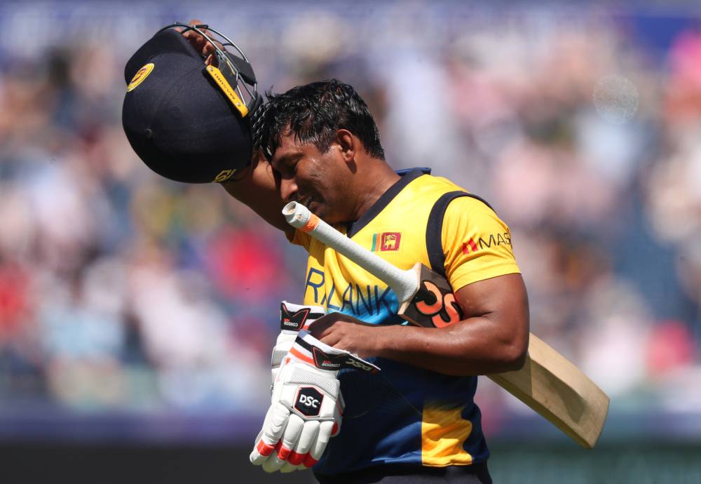 Cricket - ICC Cricket World Cup - Sri Lanka v South Africa -  Emirates Riverside, Chester-Le-Street, Britain - June 28, 2019   South Africa's Chris Morris takes the wicket of Sri Lanka's Jeevan Mendis   Action Images via Reuters/Lee Smith