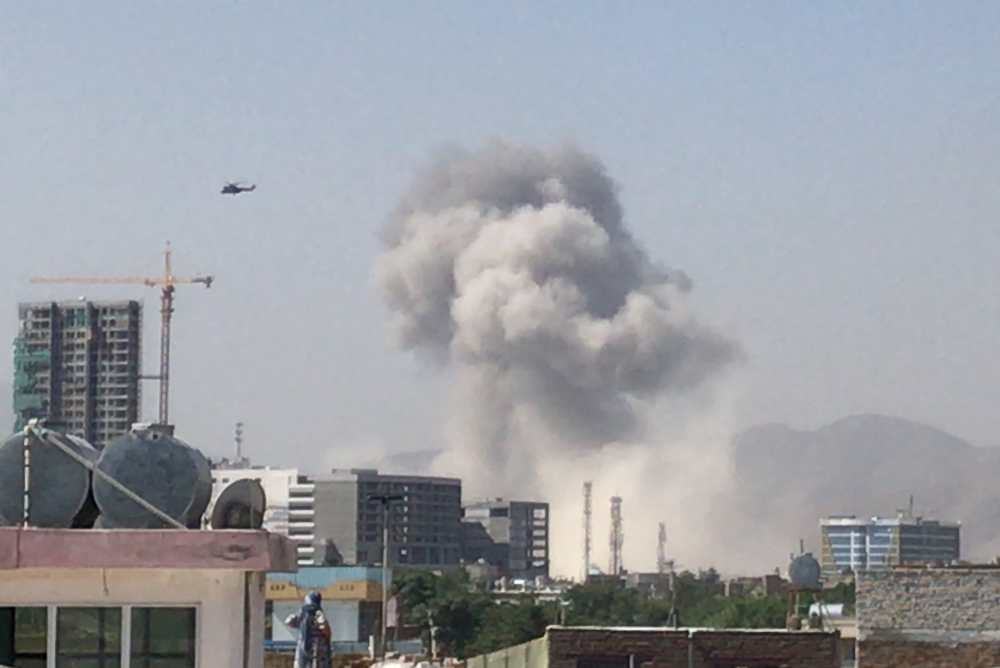 Smoke rises from the site of a blast in Kabul on Monday. — Reuters