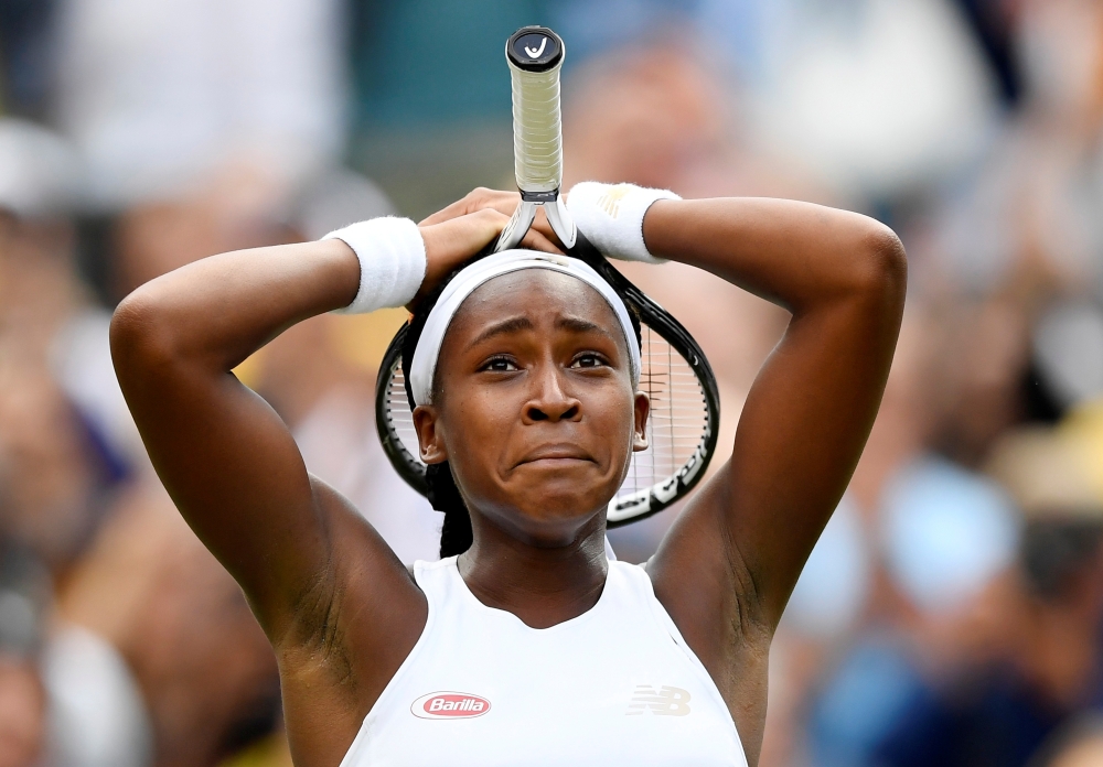 US player Cori Gauff is congratulated by US player Venus Williams after winning their women's singles first round match on the first day of the 2019 Wimbledon Championships at The All England Lawn Tennis Club in Wimbledon, southwest London, on Monday. — AFP