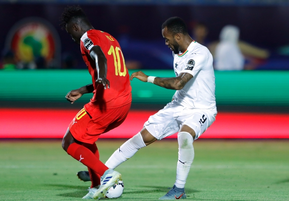 Ghana's forward Jordan Ayew (R) dribbles past Guinea-Bissau's midfielder Pele during the 2019 Africa Cup of Nations (CAN) Group F football match between Guinea-Bissau and Ghana at the Suez Stadium in the north-eastern Egyptian city on Tuesday. — AFP