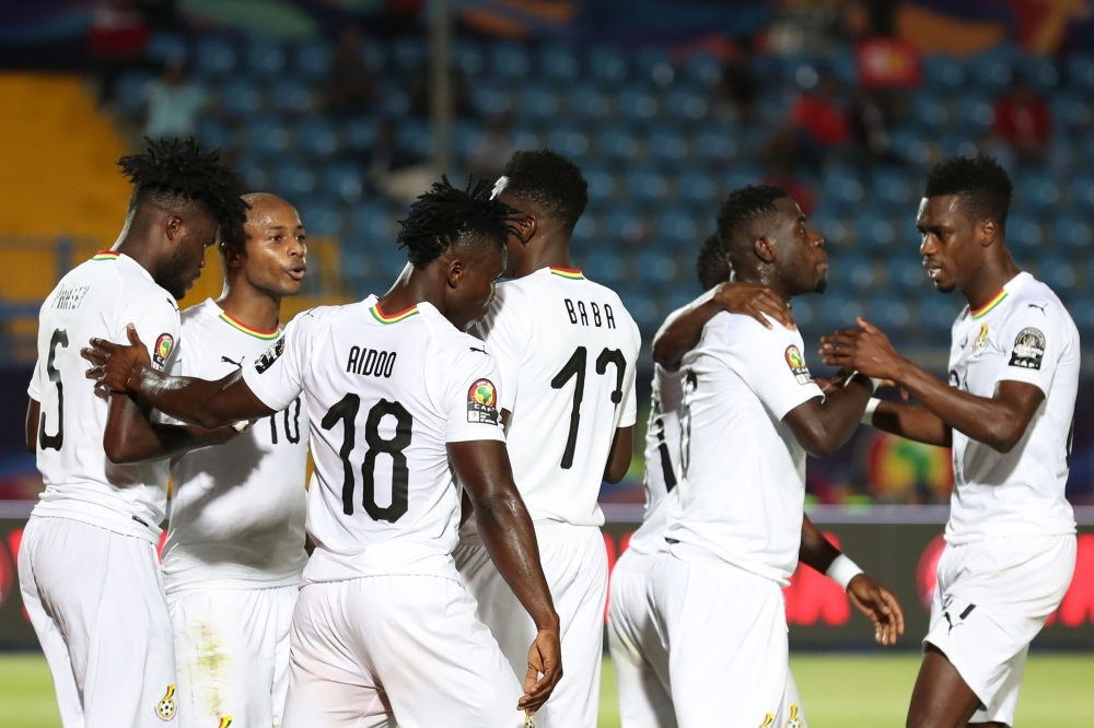 Ghana's forward Jordan Ayew (R) dribbles past Guinea-Bissau's midfielder Pele during the 2019 Africa Cup of Nations (CAN) Group F football match between Guinea-Bissau and Ghana at the Suez Stadium in the north-eastern Egyptian city on Tuesday. — AFP