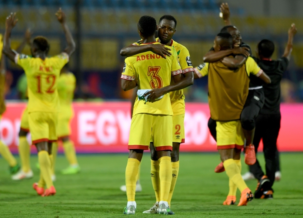 Benin players celebrate after qualifying for the round of 16 during the 2019 Africa Cup of Nations (CAN) Group F football match between Benin and Cameroon at the Ismailia Stadium in the north-eastern Egyptian city on Tuesday. — AFP