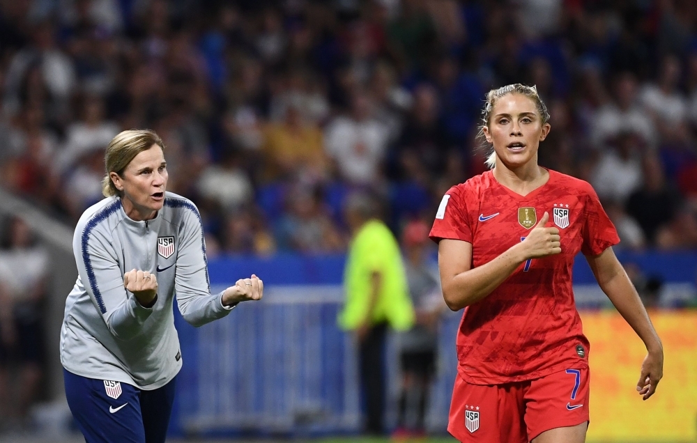 United States' coach Jillian Ellis (L) speaks to United States' defender Abby Dahlkemper  during the France 2019 Women's World Cup semifinal football match against England on Tuesday at the Lyon Satdium in Decines-Charpieu, central-eastern France. — AFP