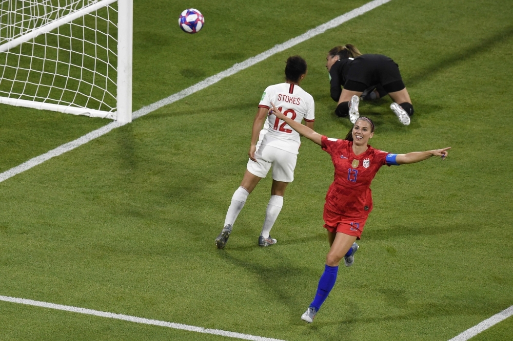 United States' forward Alex Morgan (C) celebrates after scoring a goal during the France 2019 Women's World Cup semifinal football match against England at the Lyon Satdium in Decines-Charpieu, central-eastern France on Tuesday. — AFP 