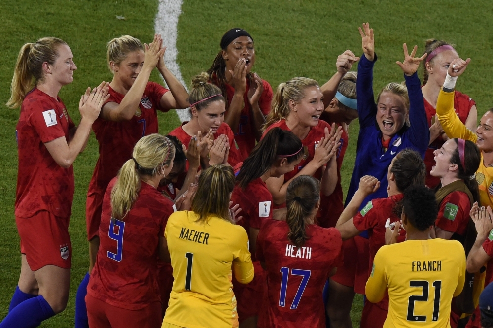 United States' forward Alex Morgan (C) celebrates after scoring a goal during the France 2019 Women's World Cup semifinal football match against England at the Lyon Satdium in Decines-Charpieu, central-eastern France on Tuesday. — AFP 