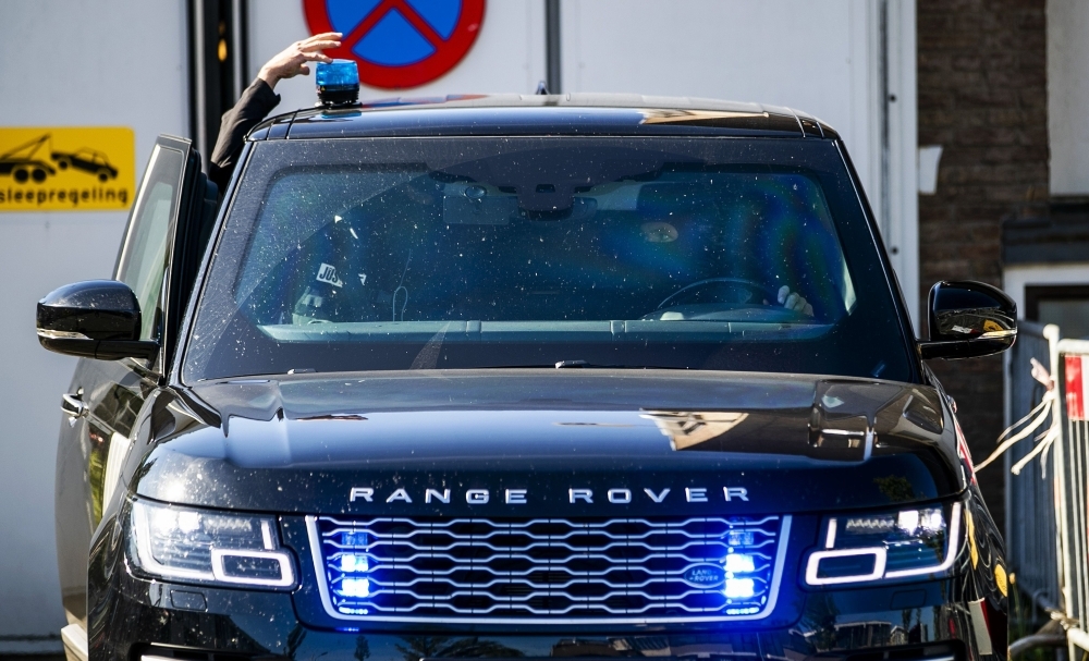 Secured vehicles arrive at the heavily secured Bunker prior to the decision in the criminal case against Willem Holleeder in Amsterdam, the Netherlands, on Thursday. — AFP
