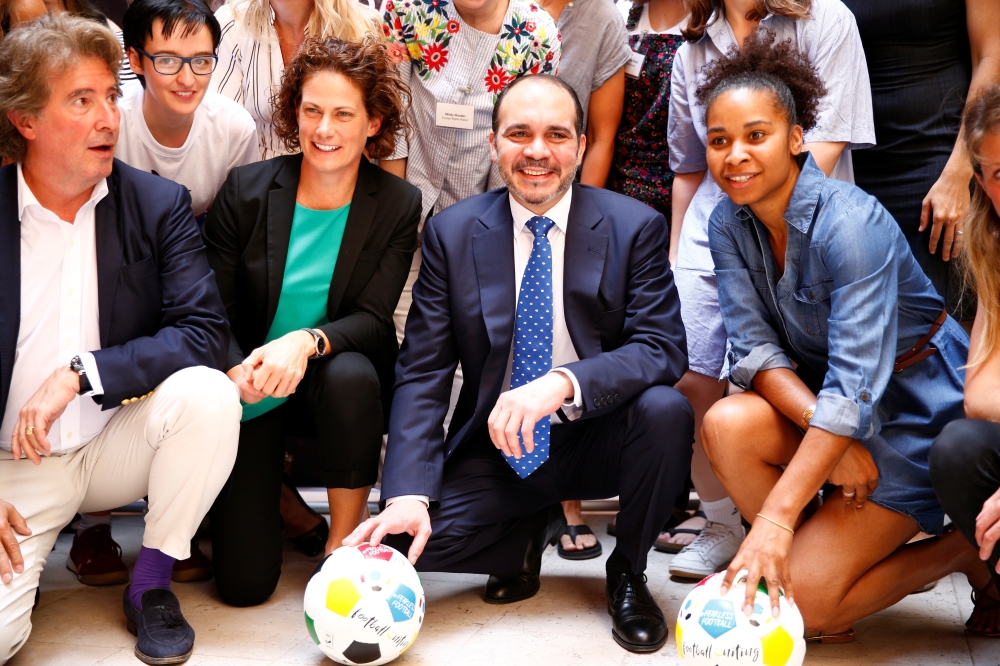 Jordan's Prince Ali Bin Al Hussein, founder and chairman of the Association Football Development Program Global (AFDP) and Kelly Lindsey, coach of Afghanistan Women's National Football Team, launch a campaign to stop abuse, harassment and exploitation in women's soccer in Lyon, France, on Wednesday. — Reuters