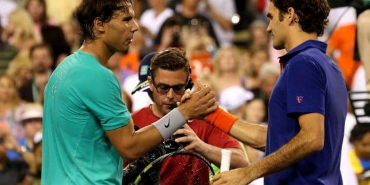 Rafael Nadal of Spain (L) shakes hands with Roger Federer of Switzerland after Nadal won their quarterfinal match during day 9 of the BNP Paribas Open at Indian Wells Tennis Garden in Indian Wells, California in this file photo of March 14, 2013. Nadal won 6-4, 6-2. — Courtesy photo