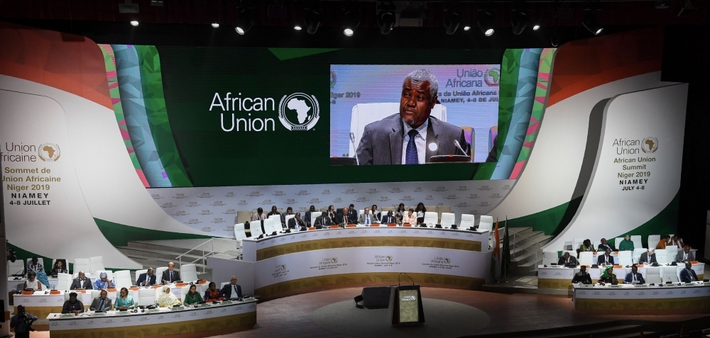 Chairperson of the African Union Commission Moussa Faki Mahamat (C) delivers a speech at the opening of the 35th Ordinary Session of the Executive Committee of the African Union (AU) at the Palais des Congres in Niamey, on July 4, 2019. — AFP