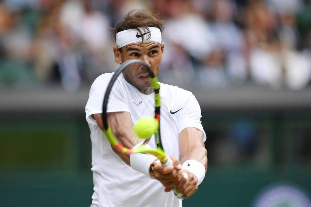 Roger Federer defeats Britain's Jay Clarke in straight sets at Wimbledon. — AFP/File