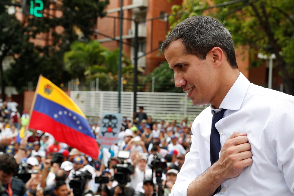 Venezuelan opposition leader Juan Guaido, who many nations have recognized as the country's rightful interim ruler, gestures during a rally against the government of President Nicolas Maduro and to commemorate the 208th anniversary of the country's independence in Caracas, Venezuela July 5 2019. -Reuters