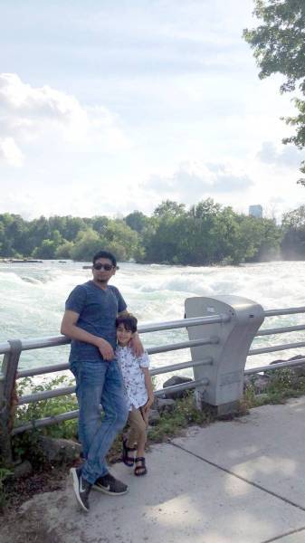 Missing Saudi student Qasim Addawi with his son.