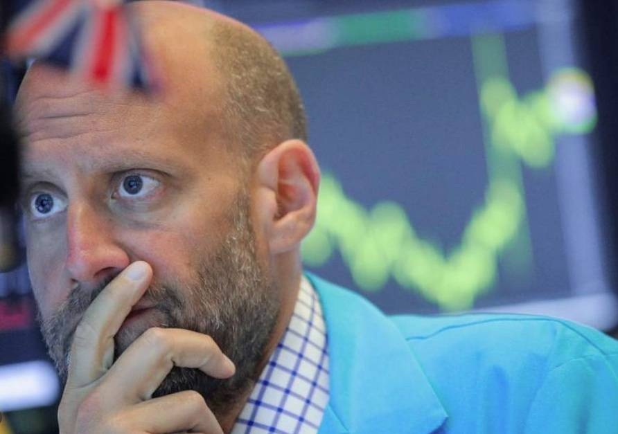 Traders work on the floor at the New York Stock Exchange (NYSE) in New York, US, in this June 24, 2019, photo. — Reuters
