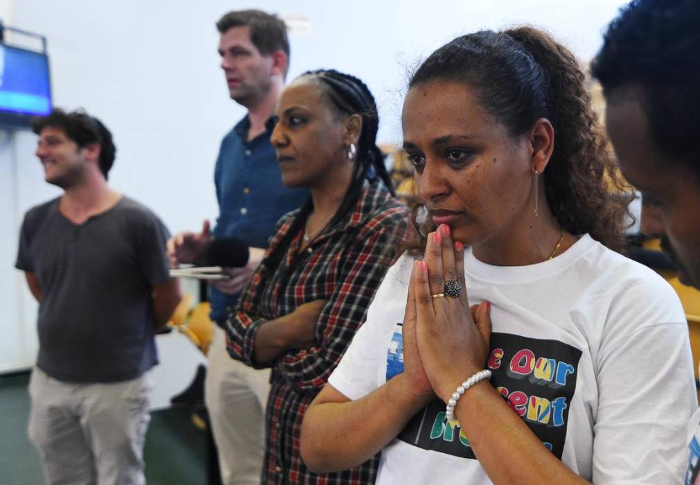 Hiwet Tesfamariam, sister of Medhanie Tesfamariam Behre reacts after hearing the verdict in the case of her brother in Palermo, Italy on Friday. -Reuters