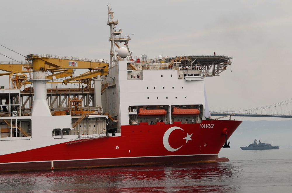 Turkish drilling vessel Yavuz is escorted by Turkish Navy frigate TCG Fatih (F-242) as it sets sail in Izmit Bay, on its way to the Mediterranean Sea, off the port of Dilovasi, Turkey, on June 20. -Reuters