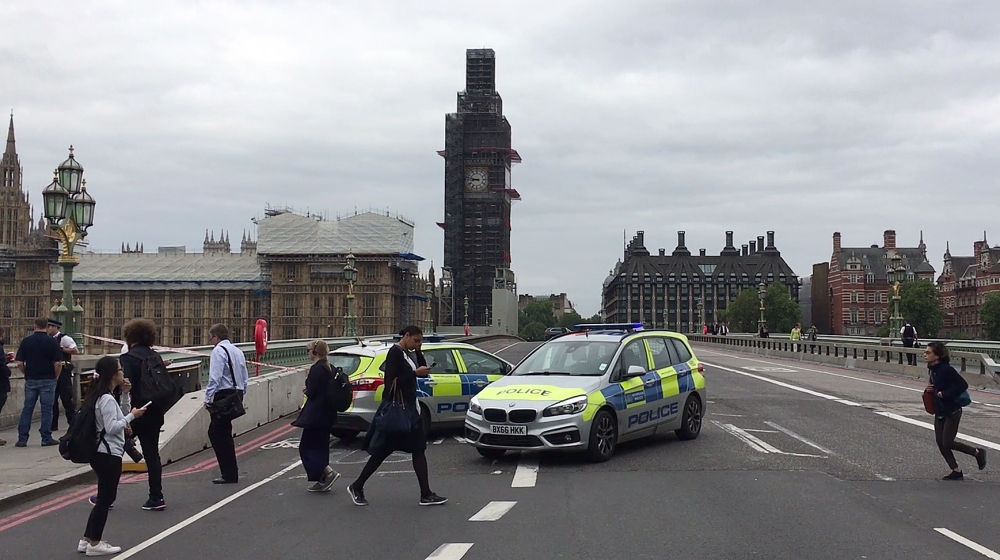 Police officers cordon off Westminster Bridge, leading to Parliament Square in central London, after a car was driven into barriers at the Houses of Parliament, in this Aug. 14, 2018 file photo. — AFP