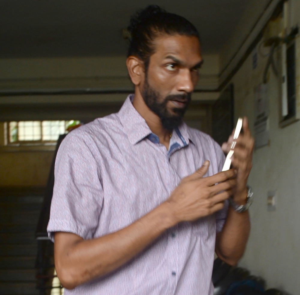 Samson D'Souza, one of two Indian defendants in the case of the rape and death of British schoolgirl Scarlett Keeling in Goa in 2008, arrives at the Children's Court in Panaji, Goa, India, in this Sept. 22, 2016 file photo.  — AFP