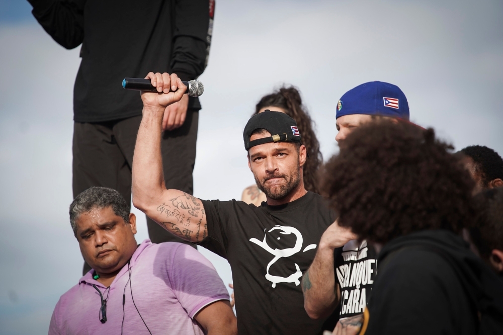 Ricky Martin gestures after speaking during a demonstration demanding Governor Ricardo Rossello's resignation in San Juan, Puerto Rico, on Wednesday. — AFP