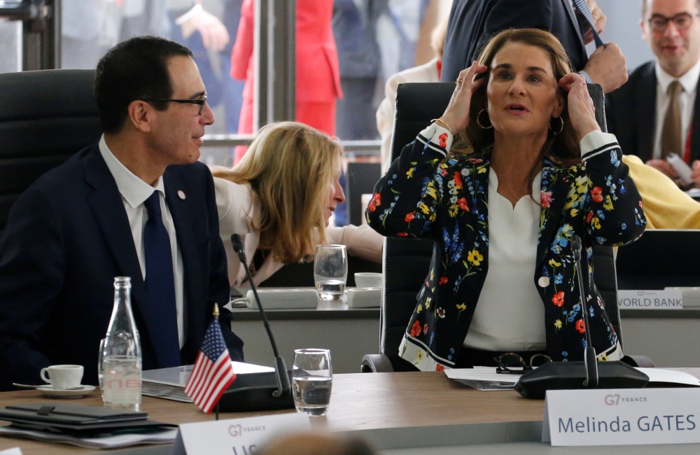 US Treasury Secretary Steven Mnuchin and philanthropist Melinda Gates, Co-Chair of the Bill and Melinda Gates Foundation, attend a meeting during the G7 finance ministers and central bank governors meeting in Chantilly, near Paris, France, on Thursday. — Reuters