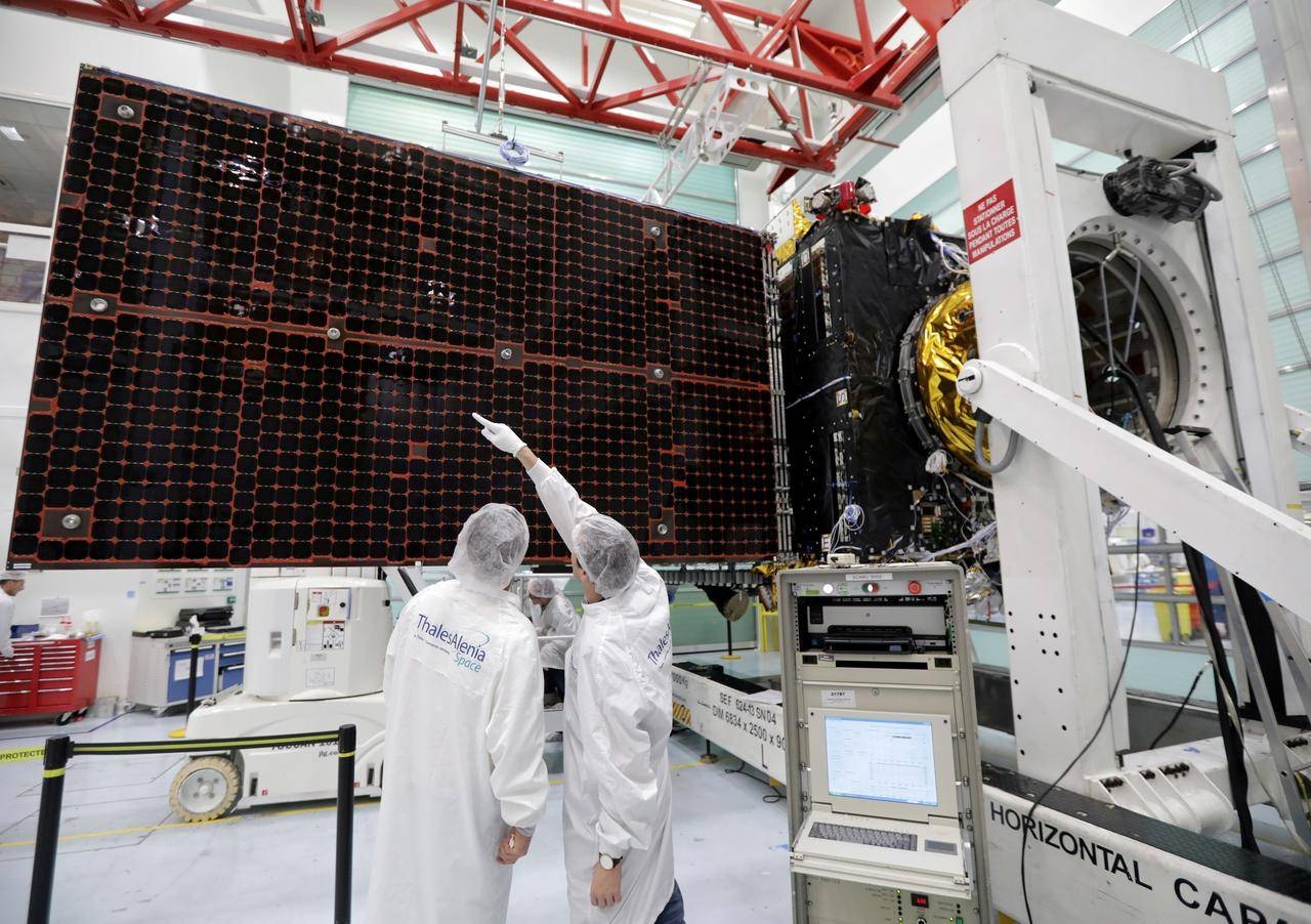A technician looks at a solar panel on the Inmarsat S-Band/Hellas-Sat 3 satellite in the clean room facilities of the Thales Alenia Space plant in Cannes, France, in this Feb. 3, 2017 file photo. — Reuters