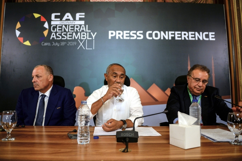 Confederation of African Football (CAF) President Ahmad Ahmad (C) attends a press conference in Cairo on Thursday on the eve of the 2019 football Africa Cup of Nations (CAN) Final between Senegal and Algeria. — AFP
