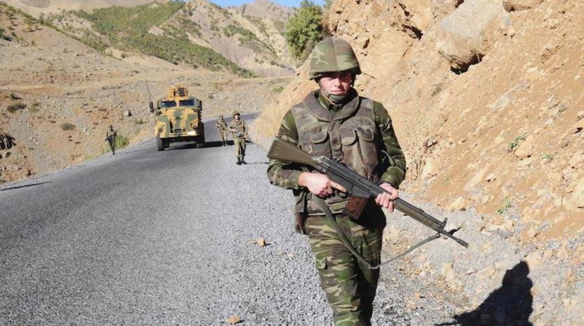 Turkish soldiers patrol a road near Cukurca in the Hakkari province, southeastern Turkey, near the Turkish-Iraqi border in this file photo. — Reuters