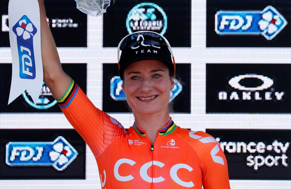 Winner CCC-Liv rider Marianne Vos of the Netherlands celebrates on the podium of the Tour de France during the La Course by Le Tour de France, on Friday. — Reuters
