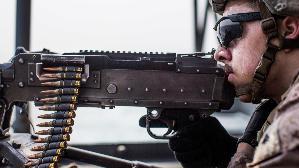 A US Marine Corps rifleman with Kilo Company, Battalion Landing Team 3/5, provides security on aboard the amphibious assault ship USS Boxer (LHD 4) during its transit through Strait of Hormuz in Gulf of Oman, Arabian Sea, on Thursday. — Reuters