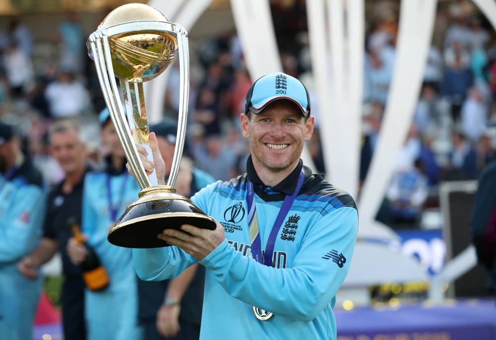 England's Eoin Morgan celebrates with the trophy after winning the  ICC Cricket World Cup at Lord's. London, Britain, on Sunday. — Reuters 