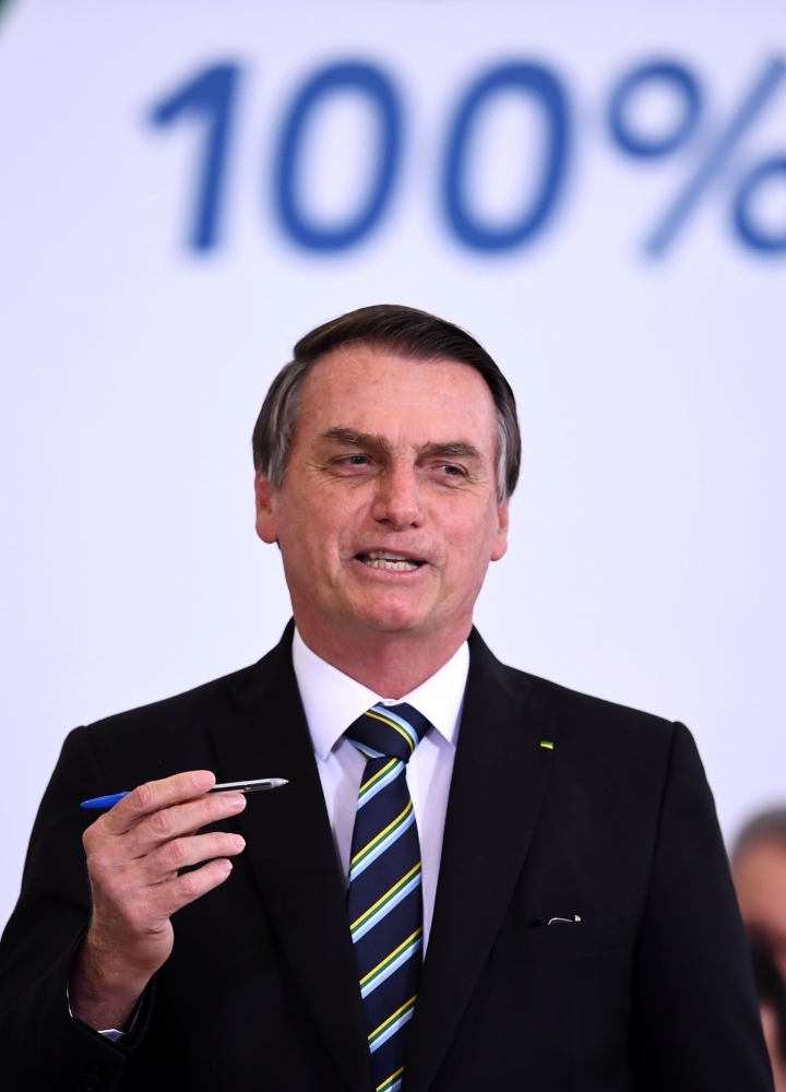 Brazilian President Jair Bolsonaro gestures during a ceremony to commemorate the first 200 days of his administration at Planalto Palace in Brasilia, on July 18, 2019. -AFP photo