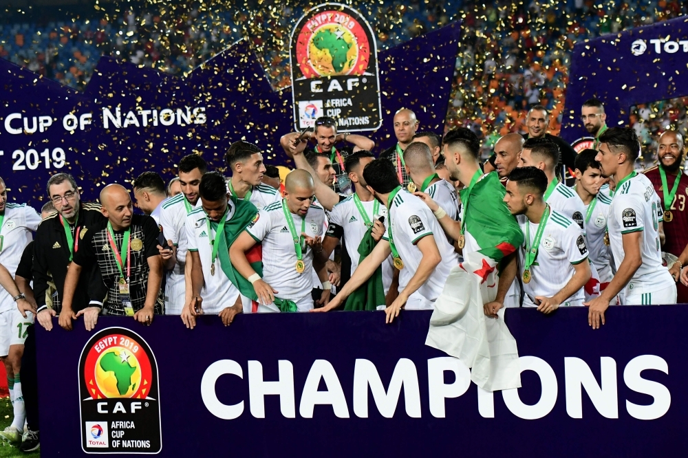 Algerian players celebrate after winning the 2019 Africa Cup of Nations final football match between Senegal and Algeria at the Cairo International Stadium in Cairo on Friday. – AFP