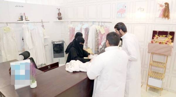 Noura Al-Dousary's shop is entirely manned by Saudi women who were giving a different touch to the laundry of men and women clothes.