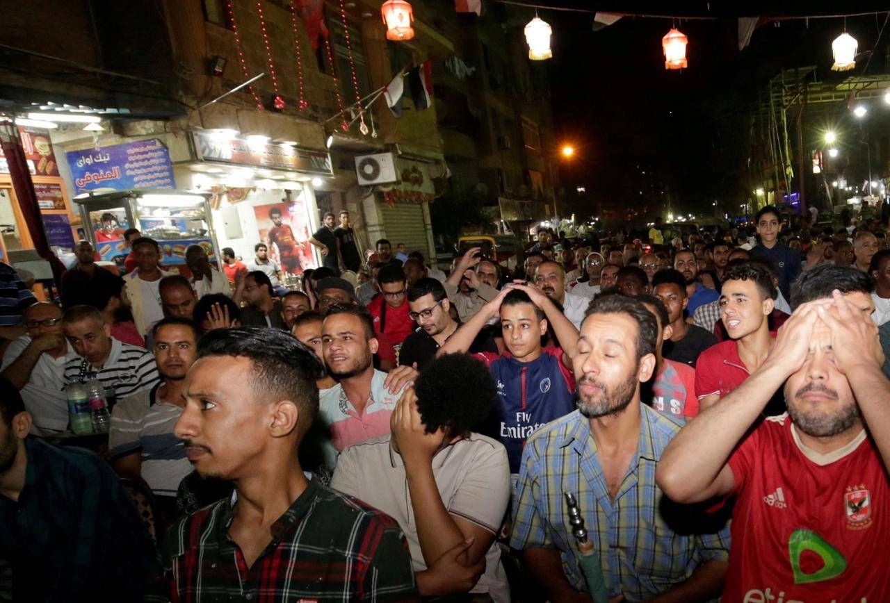 Egyptian soccer fans watching the match in a cafe in Cairo, Egypt react as Egypt concede a goal by South Africa's Thembinkosi Lorch during their Round of 16 Africa Cup of Nations match in this July 6, 2019 file photo. — Reuters