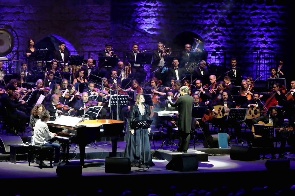 Garbriel Yared (L) and Yasmina Joumblatt (R) perform during the opening of the Beiteddine International Art Festival on Thursday, at the Beiteddine Palace in Lebanon's Chouf mountains, south of the capital Beirut. — AFP