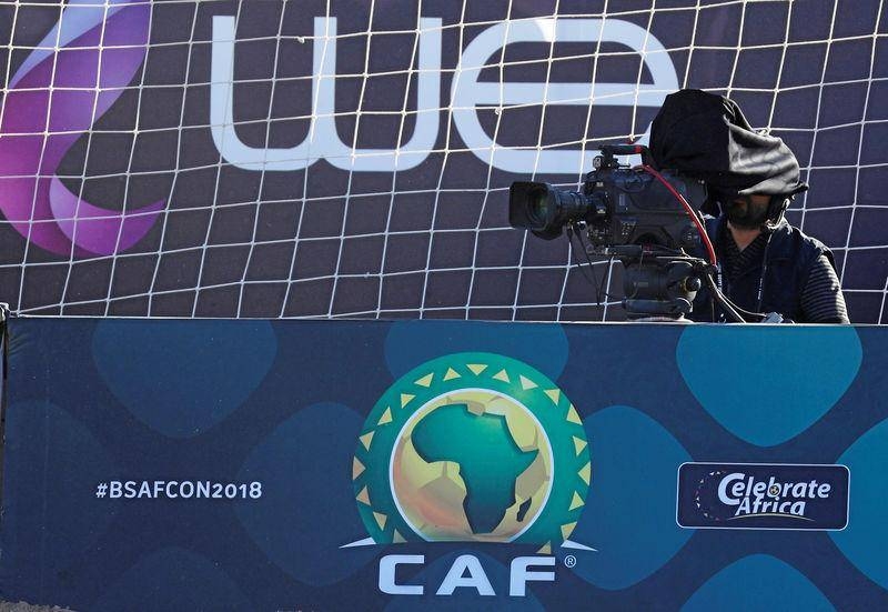 An Egyptian cameraman from Nile Sport Channel uses black curtain to watch his viewfinder during sunny weather in the final match at 2018 Beach Soccer Africa Cup of Nations (AFCON) between Senegal and Nigeria in Sharm El-Sheikh, Egypt, in this Dec. 14, 2018 file photo.  — Reuters
