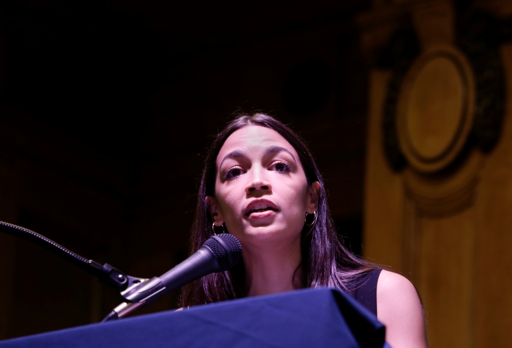 Representative Alexandria Ocasio-Cortez speaks during an Immigration Town Hall at The Nancy DeBenedittis Public School in Queens, New York on Saturday. -Reuters photo