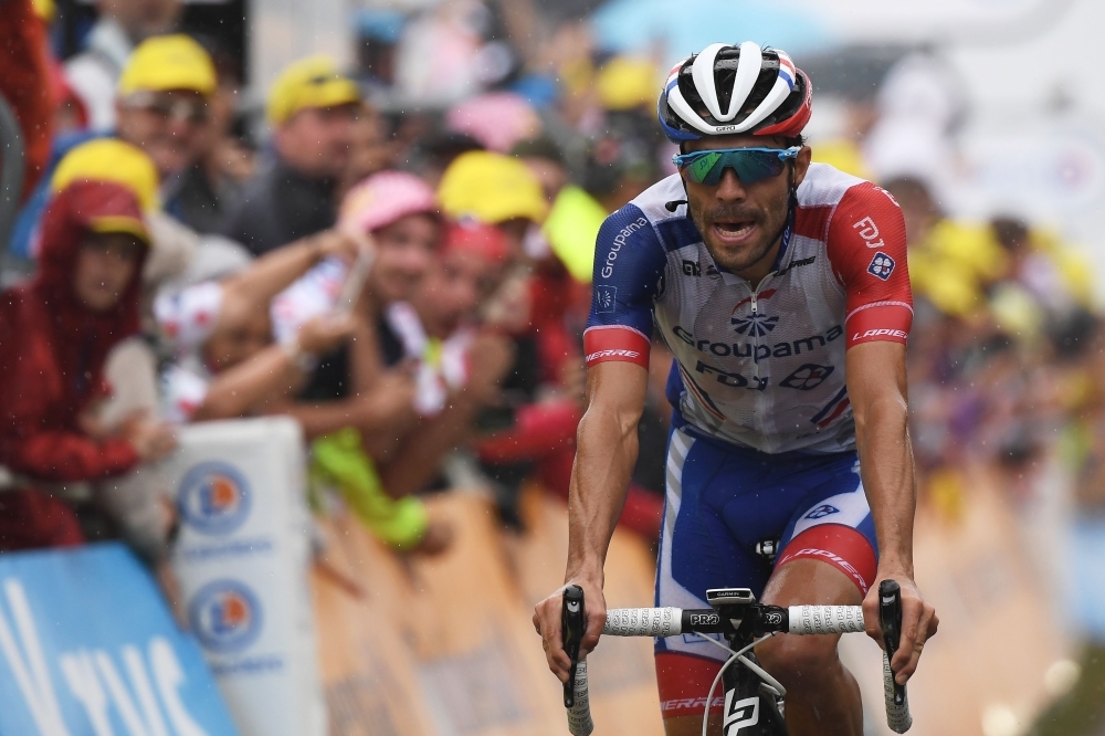 France's Thibaut Pinot reacts as he crosses the finish line of the fifteen stage of the 106th edition of the Tour de France cycling race between Limoux and Foix Prat d'Albis, in Foix Prat d'Albis, on Sunday. — AFP