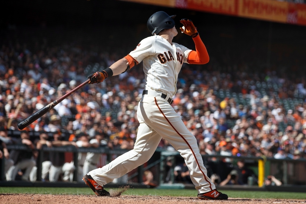 Mike Yastrzemski of the San Francisco Giants hits a walk-off home run against the New York Mets during the twelfth inning at Oracle Park in San Francisco, California, on Sunday. The San Francisco Giants defeated the New York Mets 3-2 in 12 innings.  — AFP