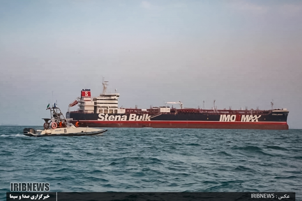 An image grab taken from a broadcast by Islamic Republic of Iran Broadcasting (IRIB) on Monday shows Iranian Revolutionary Guards in speedboats patrolling a tanker Stena Impero as it's anchored off the Iranian port city of Bandar Abbas.  — AFP