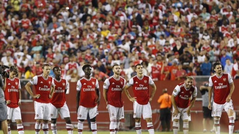 Arsenal players stand on the pitch prior to a shootout against Real Madrid in the International Champions Cup soccer series at FedEx Field, Landover, MD, USA, on Tuesay. — Reuters 