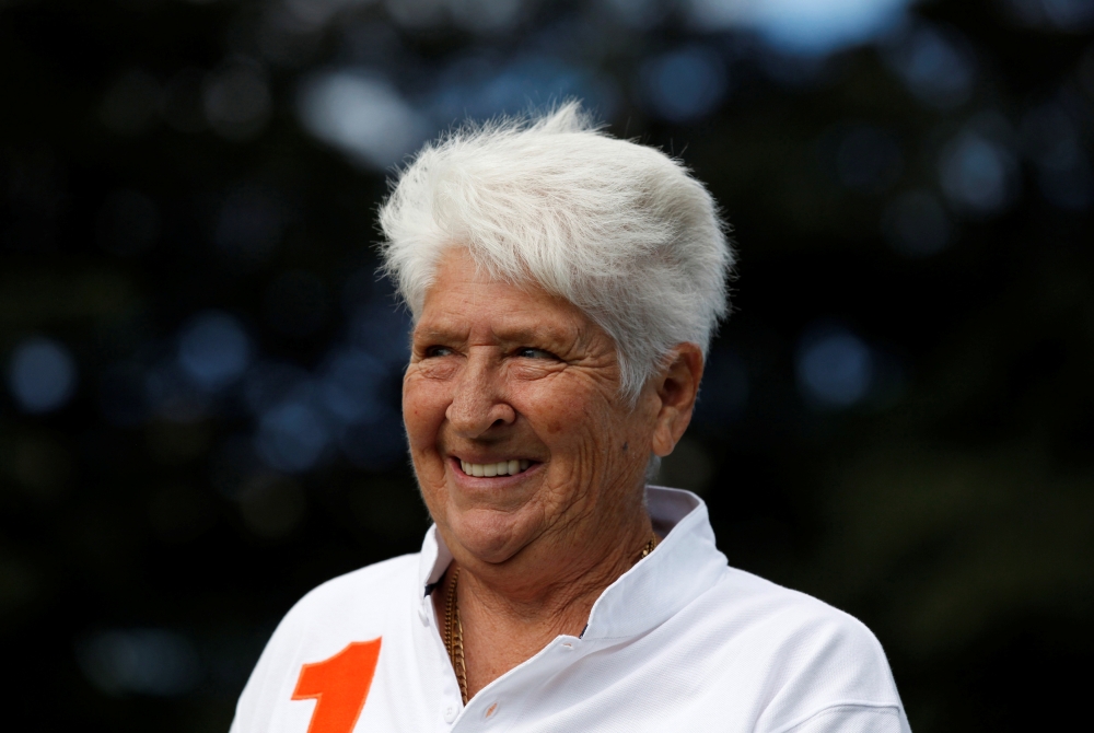 In this file photo taken on April 7, 2011, former Australian swimmer Dawn Fraser smiles during a Reuters interview in Sydney. The hair is now snowy white and the shoulders that powered her to four Olympic golds a little stooped, but Dawn Fraser still has devilment in her blue eyes and a ready opinion on her lips. — Reuters