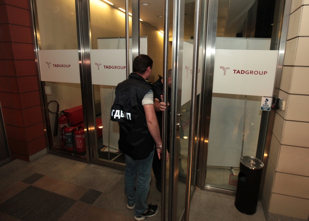 Police enter offices of a cybersecurity company in Sofia, Bulgaria, on Tuesday. — Reuters