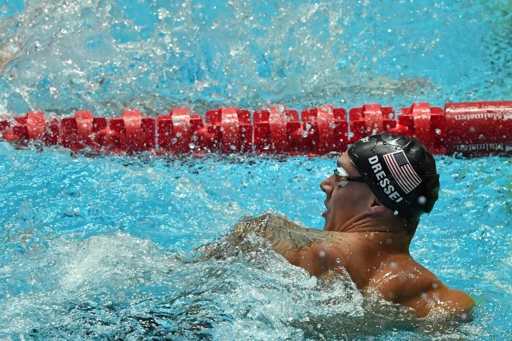 USA's Caeleb Dressel reacts after winning the final of the men's 100m freestyle event during the swimming competition at the 2019 World Championships at Nambu University Municipal Aquatics Center in Gwangju, South Korea, on Thursday. — AFP