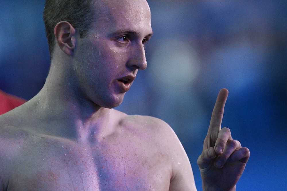 USA's Caeleb Dressel reacts after winning the final of the men's 100m freestyle event during the swimming competition at the 2019 World Championships at Nambu University Municipal Aquatics Center in Gwangju, South Korea, on Thursday. — AFP
